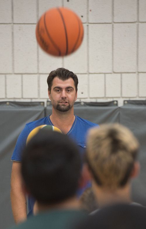 Steve Griffin  |  The Salt Lake Tribune


Turkish legend, former NBA All-Star and former Utah Jazz member, Mehmet Okur works with children, at the Sorenson Multicultural Center, on their basketball skills, in Salt Lake City, Tuesday, October 14, 2014. Okur was at the center with current Utah Jazz player Enes Kanter who was giving youth in an after school program tickets which he personally purchased as part of his ongoing participation in the Jazz player ticket donation program.  Okur, a 2007 NBA All-Star, played for the Jazz from 2004-11 and recently joined the team as an ambassador to help with the organization's alumni program, community and fan relations efforts, basketball operations and business development.