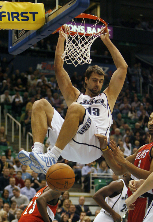 Tribune file photo
Five years removed from an All-Star season and a year after he left Utah, former Jazz center Mehmet Okur retired from the NBA on Thursday.