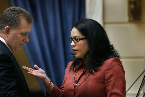 Scott Sommerdorf  |  Tribune file photo
Sen. Luz Robles, D-Salt Lake, speaks with Sen. Curt Bramble, R-Provo, in the Utah Senate just after the morning session adjourned, Thursday, March 4, 2011. Earlier the Senate voted against her bill, SB60 from being heard on the floor.