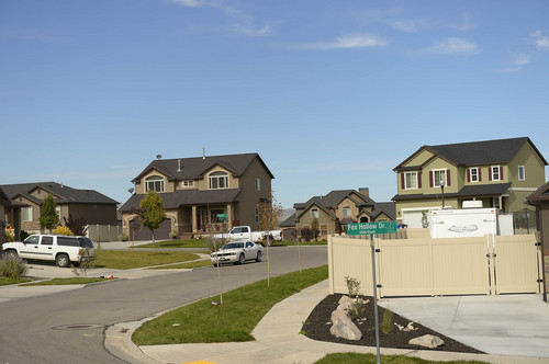 Leah Hogsten  |  The Salt Lake Tribune
Many homes now populate the area of this intersection along Fox Hollow Lane in a Saratoga Springs subdivision. But in 2007 and 2008, many of the lot owners at that time couldn't get building permits because of a lack of water to their bare lots.