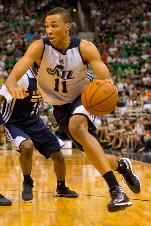 Trent Nelson  |  The Salt Lake Tribune
Danté Exum drives as the Utah Jazz hold an open practice in Salt Lake City, Thursday July 10, 2014.