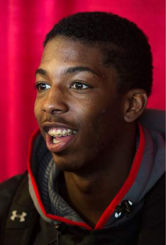 Steve Griffin  |  The Salt Lake Tribune

Delon Wright smiles as he talks with reporters during media day at the Huntsman Center on the University of Utah campus in Salt Lake City, Monday, October 6, 2014.