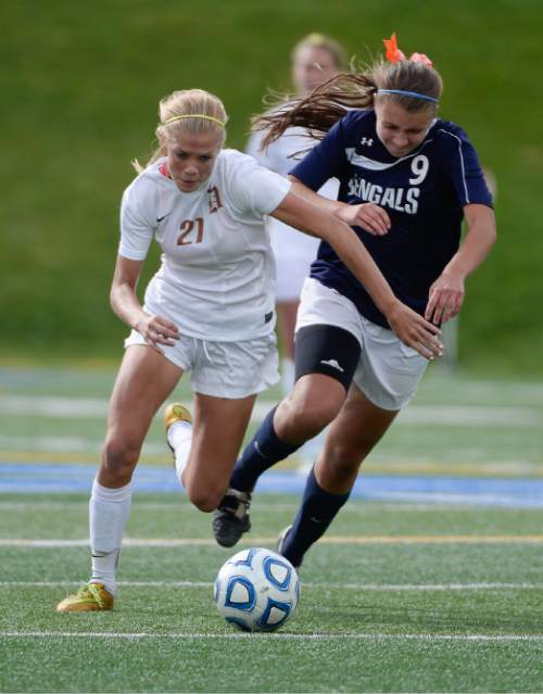 Francisco Kjolseth  |  The Salt Lake Tribune
Mikayla Colohan, left, of Davis tries to outrun Ashley Christensen of Brighton in the 5A girls' soccer semifinal at Juan Diego High School in Draper on Tuesday, Oct. 21, 2014.