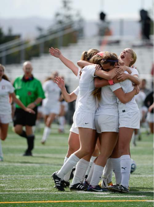 Francisco Kjolseth  |  The Salt Lake Tribune
Davis celebrates their game-winning goal by Ireland Dunn with only 12 seconds remaining in double overtime against Brighton in the 5A girls' soccer semifinal at Juan Diego High School in Draper on Tuesday, Oct. 21, 2014.