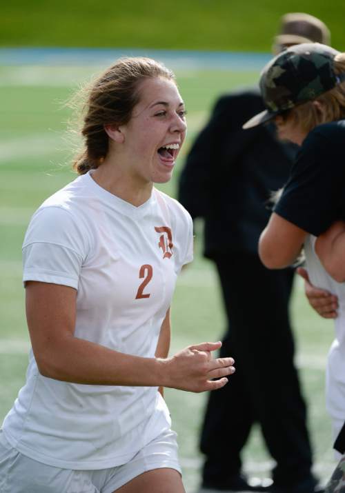 Francisco Kjolseth  |  The Salt Lake Tribune
Ireland Dunn celebrates her game-winning goal with only 12 seconds remaining in double overtime against Brighton in the 5A girls' soccer semifinal at Juan Diego High School in Draper on Tuesday, Oct. 21, 2014.