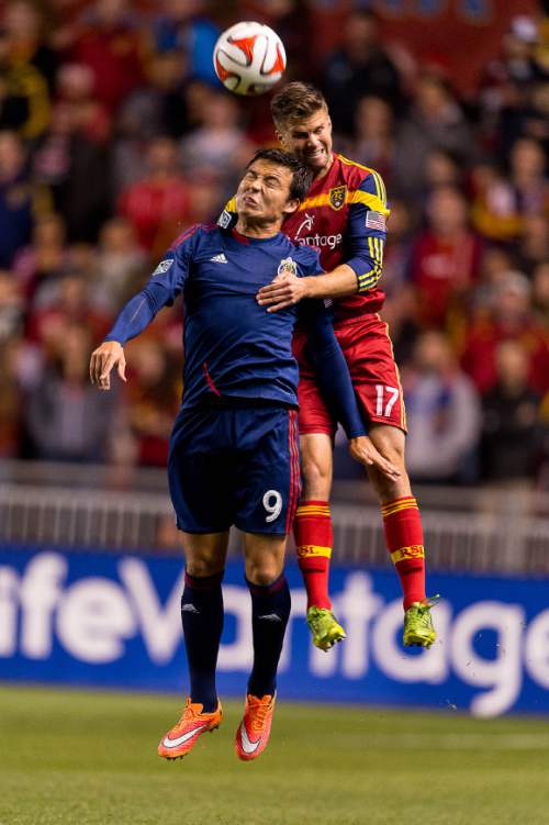 Trent Nelson  |  The Salt Lake Tribune
Chivas USA's Erick Torres (9) and Real Salt Lake's Chris Wingert (17) leap for the ball as Real Salt Lake faces Chivas USA at Rio Tinto Stadium in Sandy, Wednesday October 22, 2014.