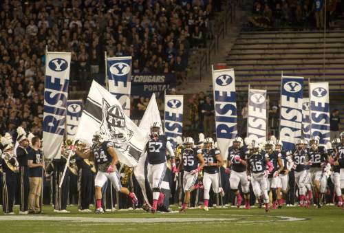 Rick Egan  |  The Salt Lake Tribune

The Cougars take to the field for the late night match-up ,BYU vs The Nevada Wolfpack at Lavell Edwards Stadium, Saturday, October18, 2014