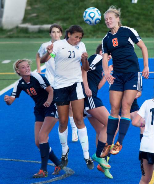 Steve Griffin  |  The Salt Lake Tribune


Imelda Williams of Timpanogos, left, and Abbey Bishop of Mountain Crest leap for the ball during class 4A girls' soccer semifinal match at Juan Diego High School  Draper, Tuesday, October 21, 2014.