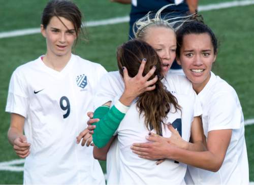 Steve Griffin  |  The Salt Lake Tribune


Aspyn Farrer, of Timpanogos, center, is congratulated by teammates after she scored a goal during class 4A girls' soccer semifinal against  Mountain Crest at Juan Diego High School  Draper, Tuesday, October 21, 2014.