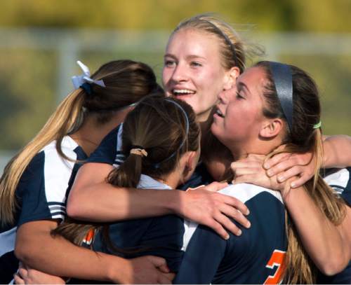 Steve Griffin  |  The Salt Lake Tribune


Mountain Crest's Abbey Bishop, center, and Chantel Crosbie, right, are hugged by teammates after Crosbie scored on a rebound of Bishop's shot during class 4A girls' soccer semifinal match against Timpanogos at Juan Diego High School  Draper, Tuesday, October 21, 2014.