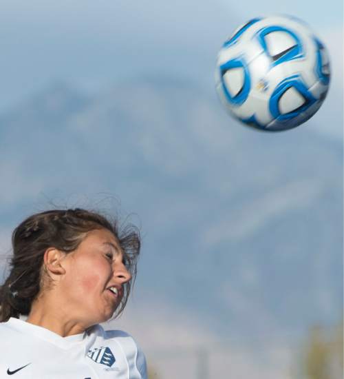 Steve Griffin  |  The Salt Lake Tribune


Imelda Williams of Timpanogos heads the ball during class 4A girls' soccer semifinal match against Mountain Crest at Juan Diego High School  Draper, Tuesday, October 21, 2014.