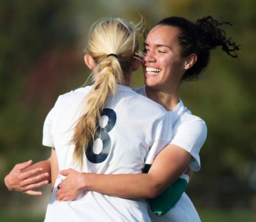 Steve Griffin  |  The Salt Lake Tribune


Jordyn Chung-Hoon, right, hugs , Devri Hartle after Hartle scored the go-ahead goal for Timpanogos during class 4A girls' soccer semifinal match against Mountain Crest at Juan Diego High School  Draper, Tuesday, October 21, 2014.