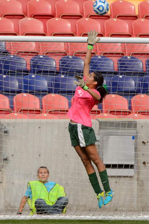 Trent Nelson  |  The Salt Lake Tribune
Rowland Hall's Alyssa Cole (21) leaps up for the ball as Rowland Hall defeats Waterford in the 2A girls' high school soccer state championship game at Rio Tinto Stadium in Sandy, Saturday October 25, 2014.