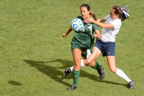 Trent Nelson  |  The Salt Lake Tribune
Rowland Hall's Mariah Papac (15) and Waterford's Alessia Johnson (25) collide as Rowland Hall defeats Waterford in the 2A girls' high school soccer state championship game at Rio Tinto Stadium in Sandy, Saturday October 25, 2014.