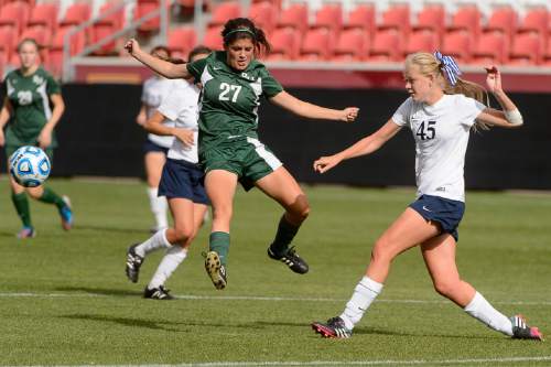 Trent Nelson  |  The Salt Lake Tribune
Rowland Hall's Julia Villar (27) looks to block the kick by Waterford's Caitlin Shreeve (45) as Rowland Hall defeats Waterford in the 2A girls' high school soccer state championship game at Rio Tinto Stadium in Sandy, Saturday October 25, 2014.