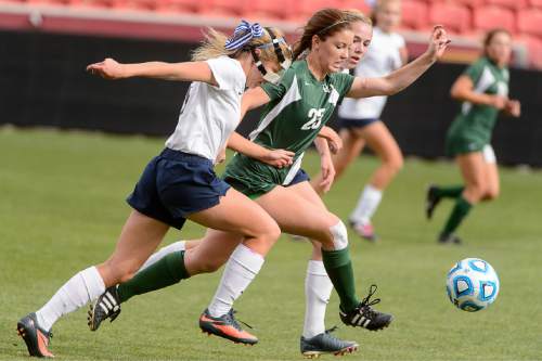 Trent Nelson  |  The Salt Lake Tribune
Waterford's Elizabeth Sampson (8) and Rowland Hall's Jessica Sterrett (23) chase the ball as Rowland Hall defeats Waterford in the 2A girls' high school soccer state championship game at Rio Tinto Stadium in Sandy, Saturday October 25, 2014.