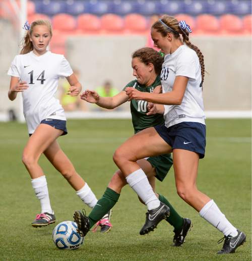 Trent Nelson  |  The Salt Lake Tribune
Rowland Hall's Megan Dingman (10) and Waterford's Grace Sponaugle (20) collide as Rowland Hall defeats Waterford in the 2A girls' high school soccer state championship game at Rio Tinto Stadium in Sandy, Saturday October 25, 2014.