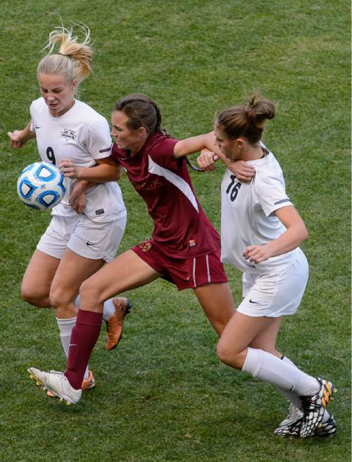 Trent Nelson  |  The Salt Lake Tribune
Desert Hills' Brittany Terry, Cedar City's Morgan Myers and Desert Hills' Mackenzie Done fight for the ball as Cedar City defeats Desert Hills in the 3A girls' high school soccer state championship game at Rio Tinto Stadium in Sandy, Saturday October 25, 2014.