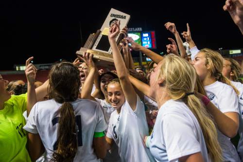 Chris Detrick  |  The Salt Lake Tribune
Members of the Timpanogos soccer team celebrate after winning during the 4A girls' state soccer championship game at Rio Tinto Stadium Friday October 24, 2014. Timpanogos defeated Skyline 7-6 in an overtime shootout.