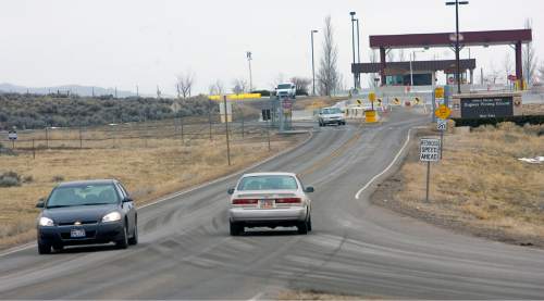 Al Hartmann  |  The Salt Lake Tribune 
Dugway Proving Ground was locked down Wednesday night due to a mislabeled vial of nerve agent that was later found.  The base was reopened Thursday morning.  Cars come and go through the front gate at noon.
