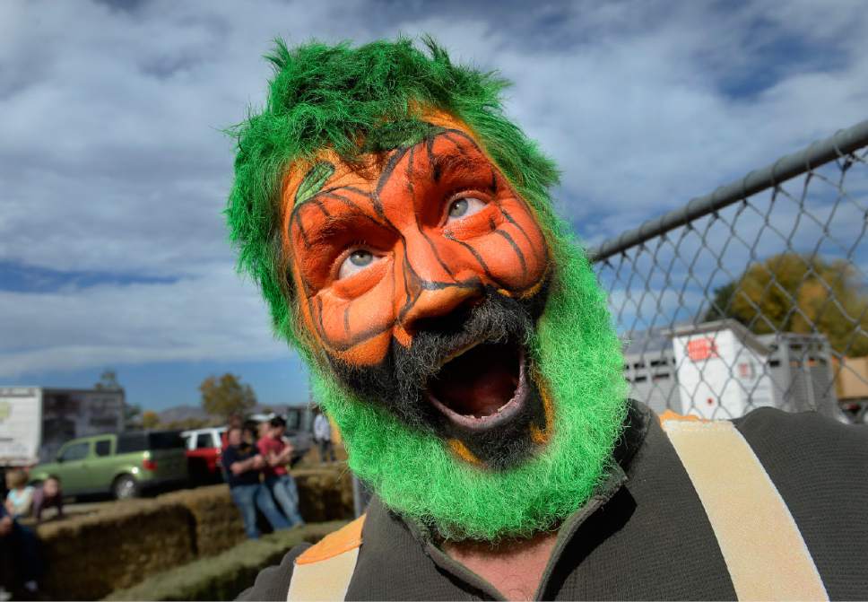 Scott Sommerdorf  |  The Salt Lake Tribune
Steve Aten wears pumpkin makeup as the character "Splat" at Hee Haw Farms in Pleasant Grove, Saturday, October 25, 2014. Hee Haw Farms and the Giant Pumpkin Growers have teamed up with the March of Dimes for the 6th Annual Giant Pumpkin Drop.