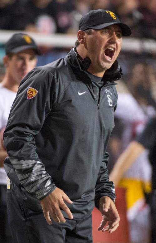 Rick Egan  |  The Salt Lake Tribune

USC Trojans coach Steve Sarkisian yells at his team, in Utes vs.Trojans, in Pac-12 action at Rice-Eccles Stadium, Saturday, October 25, 2014