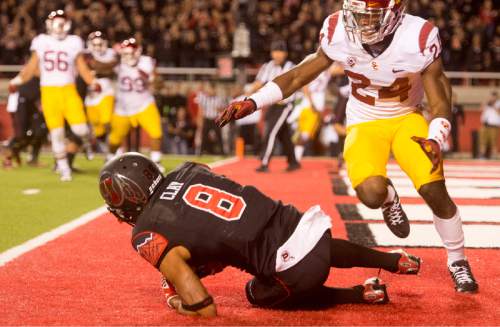 Rick Egan  |  The Salt Lake Tribune
 
USC Trojans safety Elijah Steen (24) watches Ute wide receiver Kaelin Clay (8) grab the pass that gave the Utes a 24-21 victory over the USC Trojans at Rice-Eccles Stadium, Saturday, October 25, 2014.