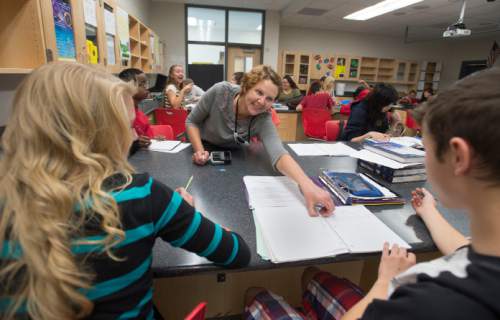 Steve Griffin  |  The Salt Lake Tribune

Susan Atkin works with students in her 10th-grade Core Chemistry class at Granger High School in West Valley City, Friday, October 24, 2014.