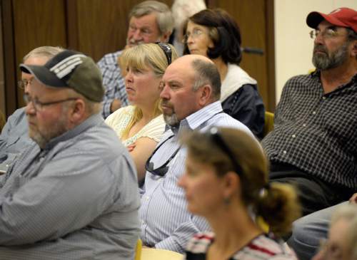 Al Hartmann  |  The Salt Lake Tribune
Residents of western Juab County listen to a U.S. Air Force representative's presentation at a public forum Monday October 20 at West Desert High School in Partoun, to discuss expanding the Utah Test and Training Range.