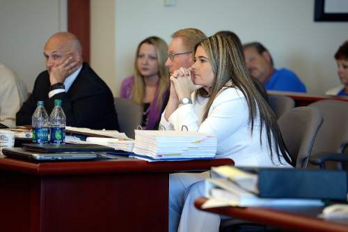 Scott Sommerdorf  |  The Salt Lake Tribune
Defense attorney Lindsay Jarvis listens as the prosecution makes their final closing arguments during day three of Cowley's preliminary hearing, Wednesday, October 8, 2014. Cowley is charged with second-degree felony manslaughter for Nov. 2, 2012, fatal shooting of 21-year-old Danielle Willard.