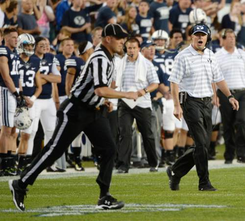 Steve Griffin  |  The Salt Lake Tribune


BYU head coach Bronco Mendenhall walks onto the field after officials called a penalty on BYU during game between BYU and Houston and LaVell Edwards Stadium in Provo, Thursday, September 11, 2014.