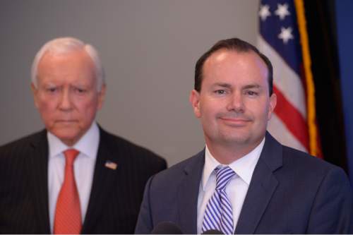 Leah Hogsten  |  The Salt Lake Tribune
l-r Senators  Orrin Hatch and Mike Lee held a press conference on behalf of GOP congressional candidate Mia Love at the Utah Republican Party headquarters, October 22, 2014. The congressional delegation wanted to voice their support for Love, encouraging citizens to ignore what they think is a negative characterization from her opponent.