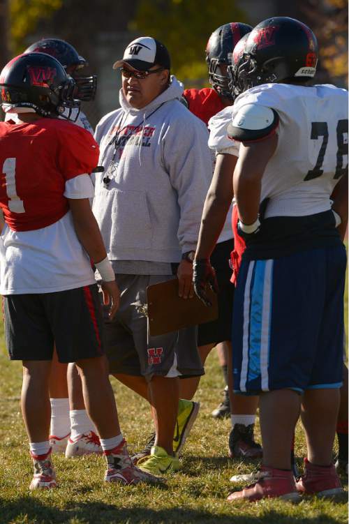 Leah Hogsten  |  The Salt Lake Tribune
West's head coach Keith Lopati is in his third season.  West High School is the winningest football team in Utah history. West has revived its winning league title for the first time since 1995, and the team prepares for Friday's state tournament game during practice, October 29, 2014.