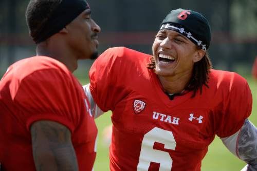Francisco Kjolseth  |  The Salt Lake Tribune
Wide receivers Kenneth Scott, left, and Dres Anderson joke with one another during an interview following the Utes first full contact practice with all pads.