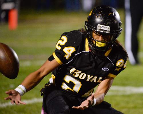 Francisco Kjolseth  |  The Salt Lake Tribune
Tyler Eteuati, #24, of Roy has the ball slip away in game action against Sky View Thursday, Oct. 23, 2014, at Roy High School.