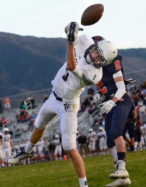 Scott Sommerdorf  |  The Salt Lake Tribune
Syracuse WR Colton Yardley can't hang on to this pass in the end zone during second half play. Brighton beat Syracuse 35-14 in a 5A first-round playoff game at Brighton, Friday, October 31, 2014.