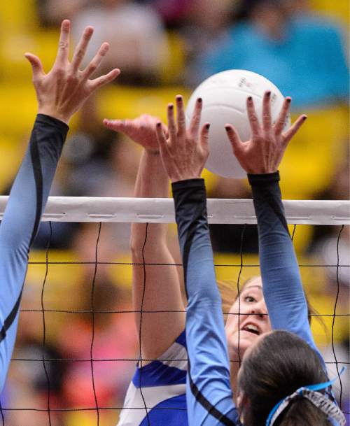 Trent Nelson  |  The Salt Lake Tribune
Panguitch's Chesney Campbell (28) hits the ball as Panguitch defeats Piute High School in the championship match of the State 1A Volleyball Tournament at Utah Valley University in Provo, Saturday November 1, 2014.