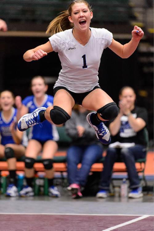 Trent Nelson  |  The Salt Lake Tribune
Panguitch's Catania Holman (1) celebrates a point as Panguitch defeats Piute High School in the championship match of the State 1A Volleyball Tournament at Utah Valley University in Provo, Saturday November 1, 2014.
