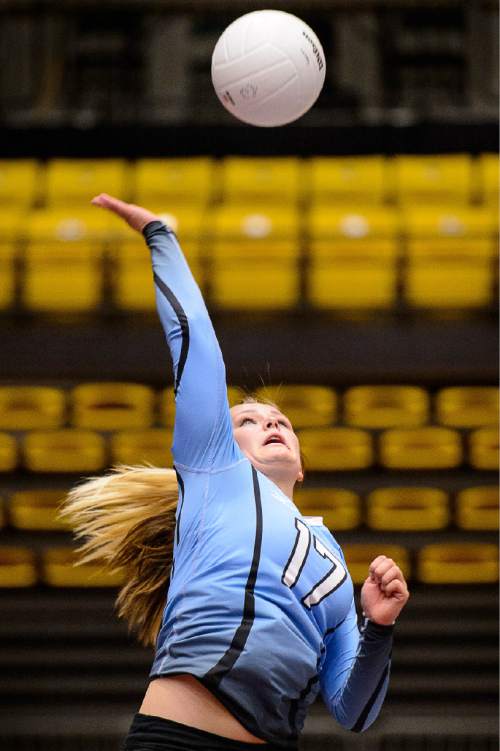 Trent Nelson  |  The Salt Lake Tribune
Piute's Mikaylee Morgan (17) hits the ball as Panguitch defeats Piute High School in the championship match of the State 1A Volleyball Tournament at Utah Valley University in Provo, Saturday November 1, 2014.
