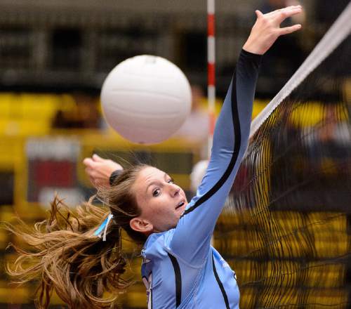 Trent Nelson  |  The Salt Lake Tribune
Piute's Paige Jessen (10) looks to the ball as Panguitch defeats Piute High School in the championship match of the State 1A Volleyball Tournament at Utah Valley University in Provo, Saturday November 1, 2014.
