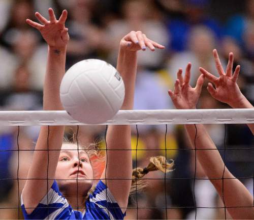 Trent Nelson  |  The Salt Lake Tribune
Panguitch's Darri Frandsen (10) makes a block as Panguitch faces Piute High School in the championship match of the State 1A Volleyball Tournament at Utah Valley University in Provo, Saturday November 1, 2014.