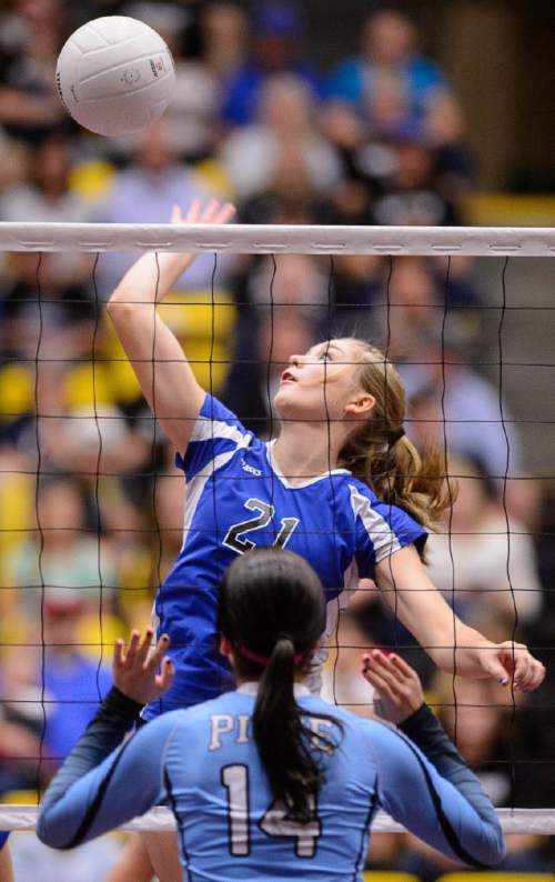 Trent Nelson  |  The Salt Lake Tribune
Panguitch's Taylor Bennett (21) hits the ball as Panguitch defeats Piute High School in the championship match of the State 1A Volleyball Tournament at Utah Valley University in Provo, Saturday November 1, 2014.
