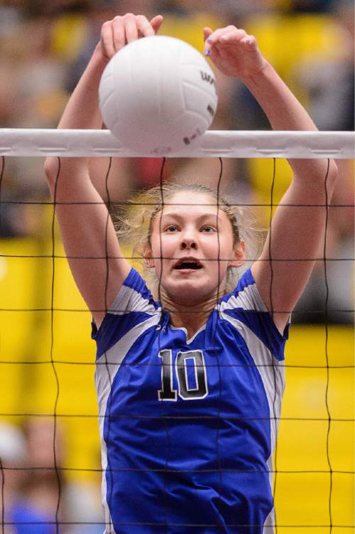 Trent Nelson  |  The Salt Lake Tribune
Panguitch's Darri Frandsen (10) scores a point as Panguitch defeats Piute High School in the championship match of the State 1A Volleyball Tournament at Utah Valley University in Provo, Saturday November 1, 2014.