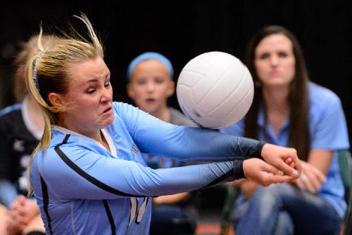 Trent Nelson  |  The Salt Lake Tribune
Piute's Mikaylee Morgan (17) hits the ball as Panguitch defeats Piute High School in the championship match of the State 1A Volleyball Tournament at Utah Valley University in Provo, Saturday November 1, 2014.