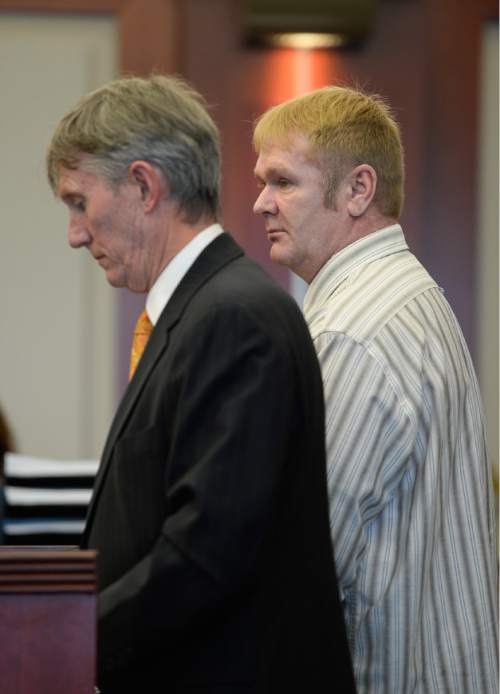 Francisco Kjolseth  |  The Salt Lake Tribune
Robert Hibbard, right, who pleaded guilty and mentally ill to second-degree felony kidnapping for taking a man hostage at the FBI office in September 2012, appears in court for sentencing alongside attorney David Mack on Monday, Nov. 3. 2014. Hibbard's ex-wife Rashell Langford had shot and killed herself as part of a suicide pact, from which her husband backed out and Hibbard was upset the husband didn't face a murder charge.