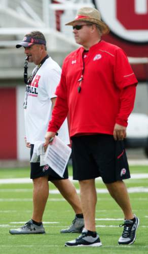 Steve Griffin  |  The Salt Lake Tribune


Utah head football coach Kyle Whittingham, left, and offensive coordinator Dave Christensen watch the offense during football practice at Rice Eccles Stadium in Salt Lake City, Utah Monday, August 4, 2014.