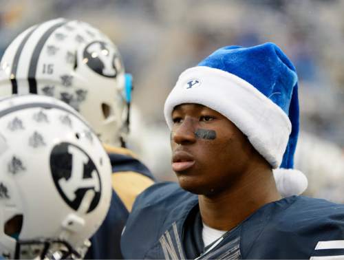 Trent Nelson  |  The Salt Lake Tribune
Brigham Young Cougars running back Jamaal Williams (21) keeps warm on the sideline during the second half as BYU hosts Idaho State, college football at LaVell Edwards Stadium in Provo, Saturday November 16, 2013.