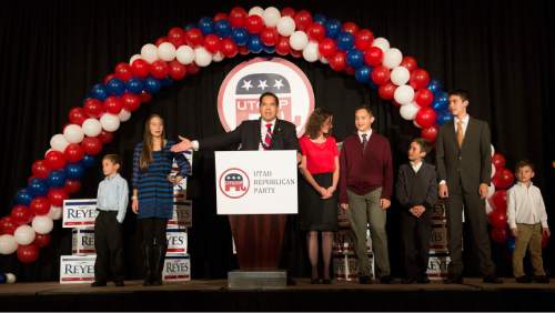 Steve Griffin  |  The Salt Lake Tribune

Surrounded by his family, Attorney General Sean Reyes delivers his victory speech during the GOP election night party at the Hilton in downtown Salt Lake City, Tuesday November 4, 2014.