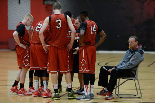 Francisco Kjolseth  |  The Salt Lake Tribune
University of Utah basketball coach Larry Krystkowiak runs his team through a workout recently. Utah's new motion offense should free up playmakers to take more initiative on the court.