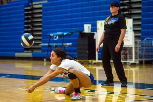 Chris Detrick  |  The Salt Lake Tribune
Volleyball coach Melissa Glasker watches as her daughter Torre Glasker practices at Bingham High School Thursday October 9, 2014.